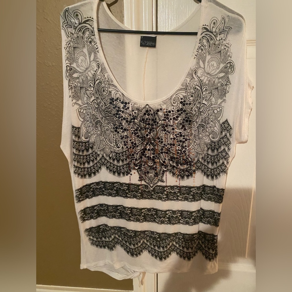 Size small. soft material, everyday day or out. Good condition.